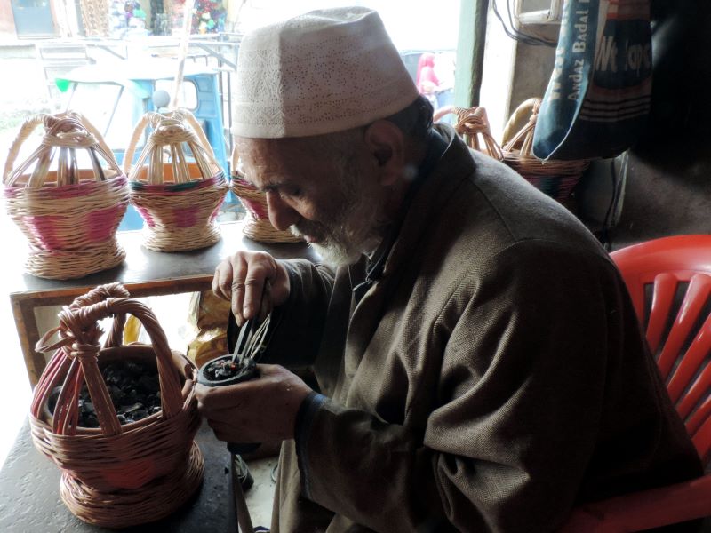 Vendors sell traditional Kashmiri firepot 'Kangri' in Srinagar