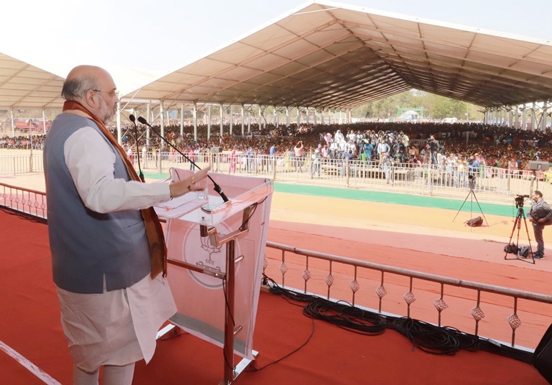 Amit Shah waves at the crowd in election rally in West Bengal