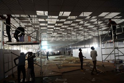 New Delhi: Workers constructing temporary COVID-19 care centre