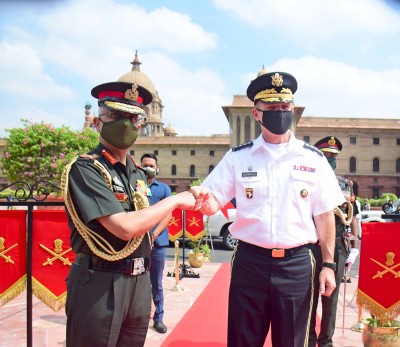 James C Mcconville being received by Manoj Mukund Naravane