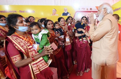 PM Modi participates in a programme in UP's Prayagraj attended by lakhs of women