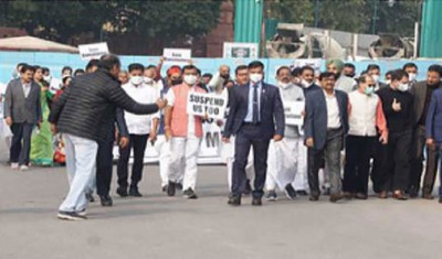 Opposition stages march against suspension of 12 MPs