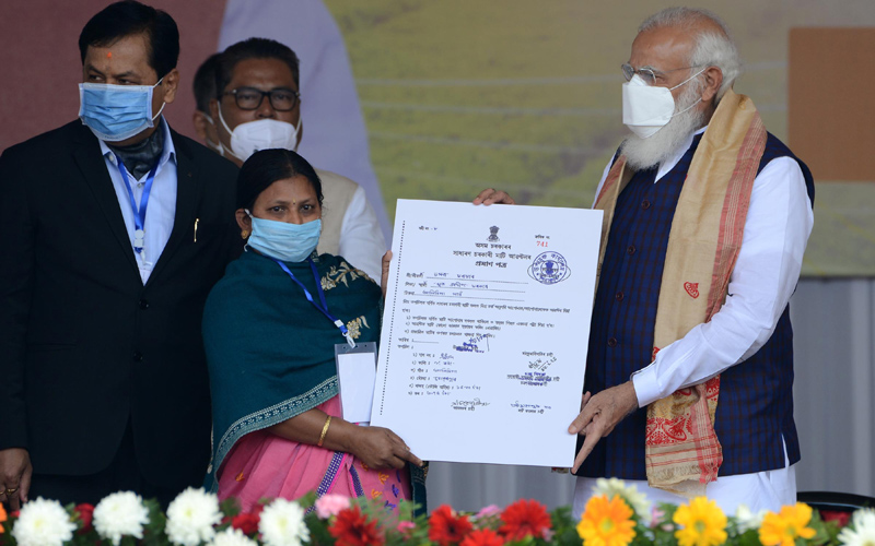 Assam: Naredra Modi distributes land patta to landless people during public meeting