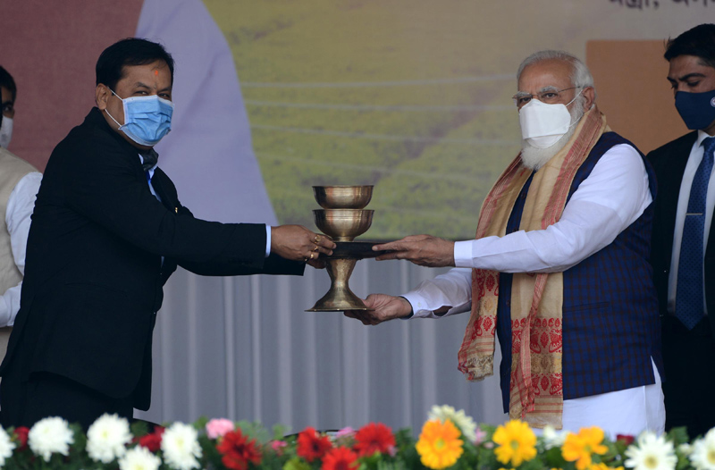 Assam: Naredra Modi distributes land patta to landless people during public meeting