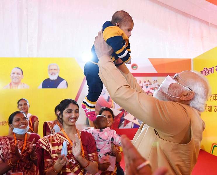 PM Modi participates in a programme in UP's Prayagraj attended by lakhs of women