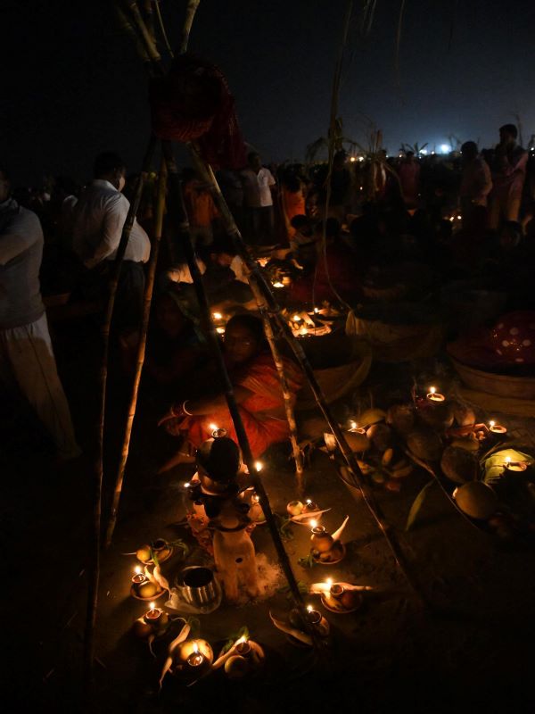 Chhat devotees paying obeisance to rising sun at the Ganges in Patna