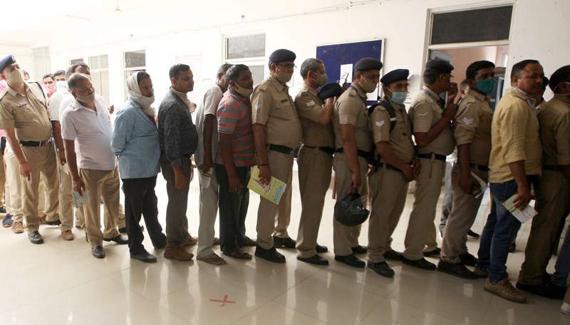 Officer receiving COVID-19 vaccine in Prayagraj