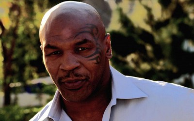 Boxing legend Tyson repeatedly strikes man who threw a water bottle