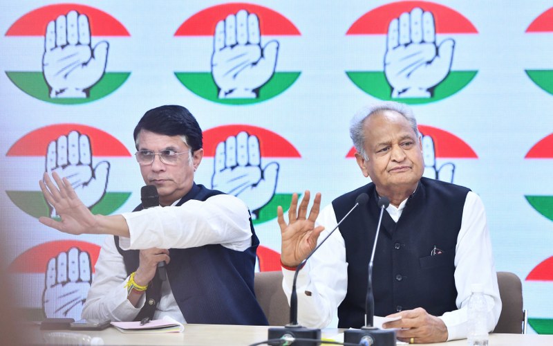 Rajasthan CM Ashok Gehlot addresses a press conference with Cong leader Pawan Khera
