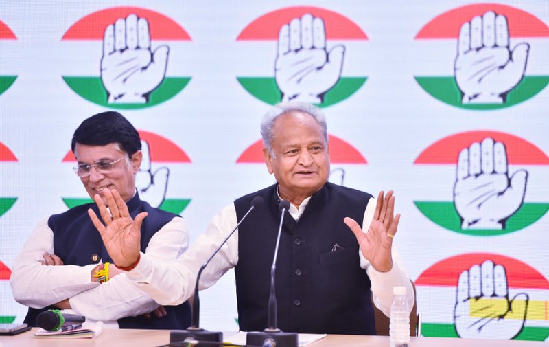 Rajasthan CM Ashok Gehlot addresses a press conference with Cong leader Pawan Khera