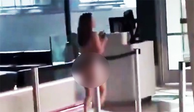 Naked woman stabs, bites staff at US airport in a 'manic episode', video viral on internet