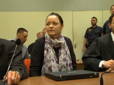 Convicted German neo-Nazi expresses remorse during confidante's trial in court