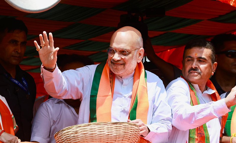 In Images: Amit Shah holds roadshow for BJP candidates in Kolkata