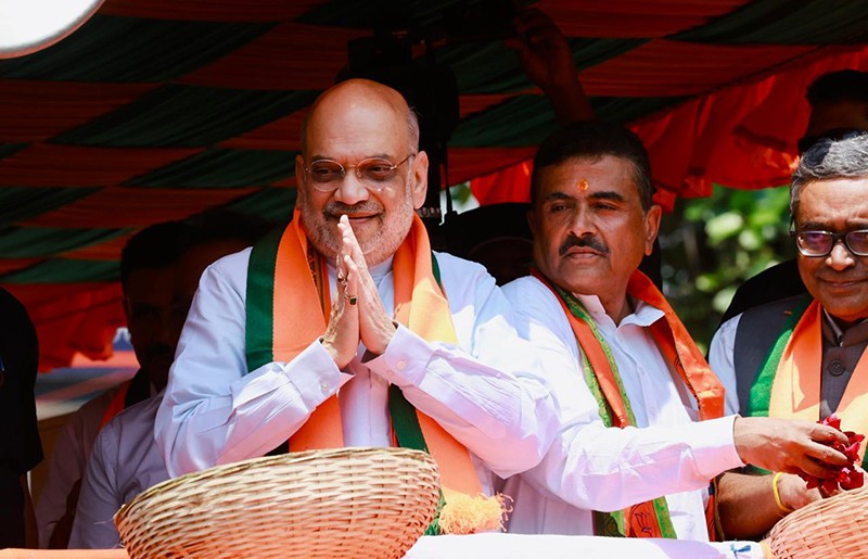 In Images: Amit Shah holds roadshow for BJP candidates in Kolkata