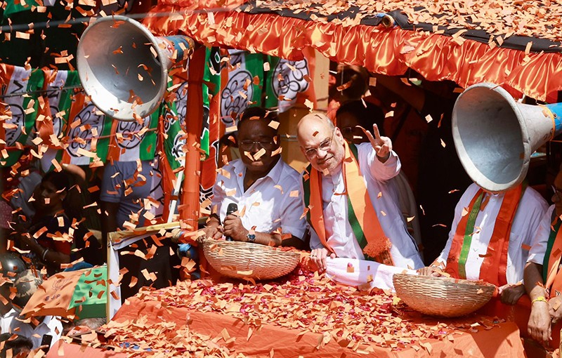 In Images: Amit Shah holds roadshow for BJP candidates in Kolkata