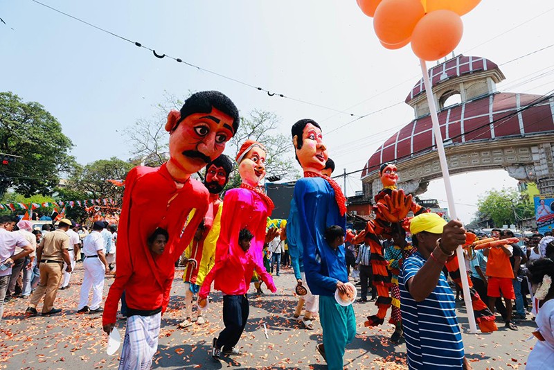 In Images: Amit Shah holds roadshow for BJP candidates in Kolkata