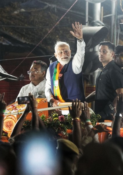 In Images: PM Narendra Modi participates in mega roadshow in North Kolkata