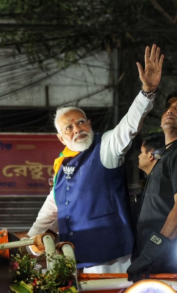 In Images: PM Narendra Modi participates in mega roadshow in North Kolkata