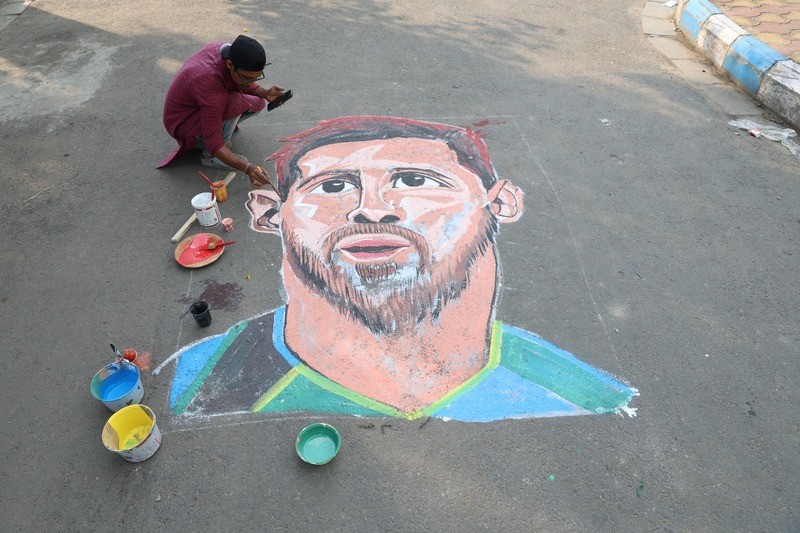 In Images: Kolkata artist celebrates global football icons with vibrant street murals