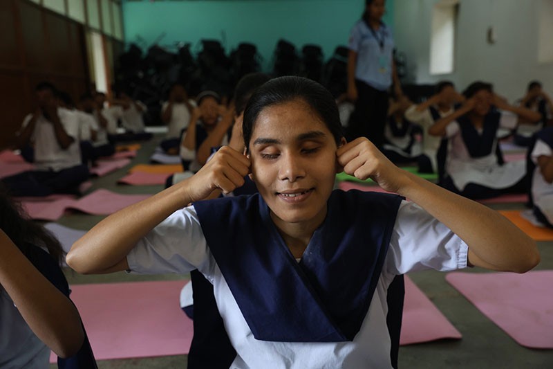 Visually impaired students of a Kolkata blind school embrace yoga ahead of Yoga Day
