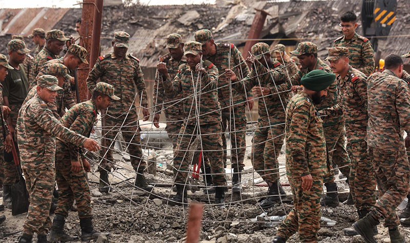 In Images: NDRF, Army intensify search as more bodies recovered from Taratala godown collapse site