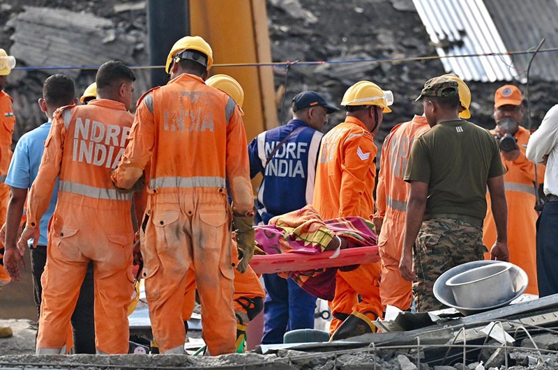 In Images: NDRF, Army intensify search as more bodies recovered from Taratala godown collapse site
