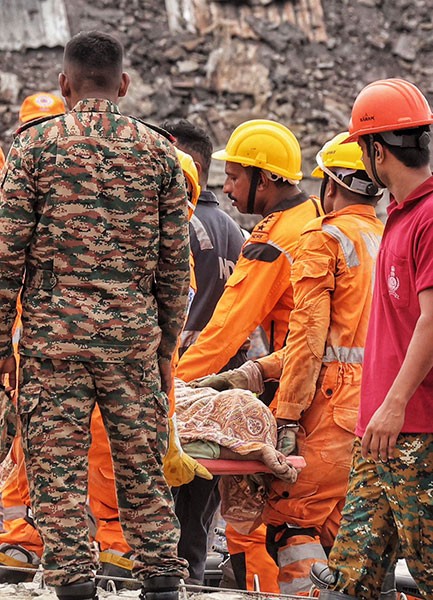 In Images: NDRF, Army intensify search as more bodies recovered from Taratala godown collapse site