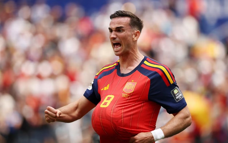 Spain edged Belgium with a late winner to secure a World Cup semi-final against France.