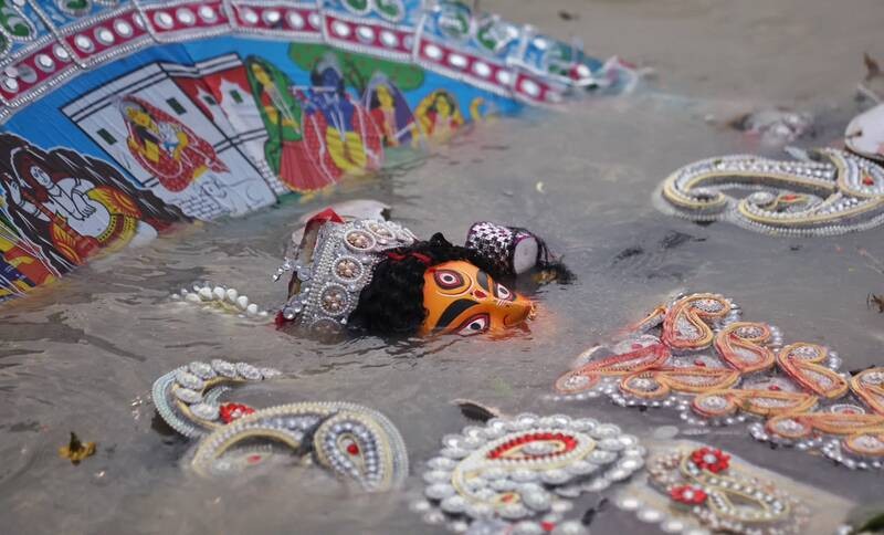 In Images: Sindoor Khela, idol immersion mark Bijoya Dashami in Kolkata
