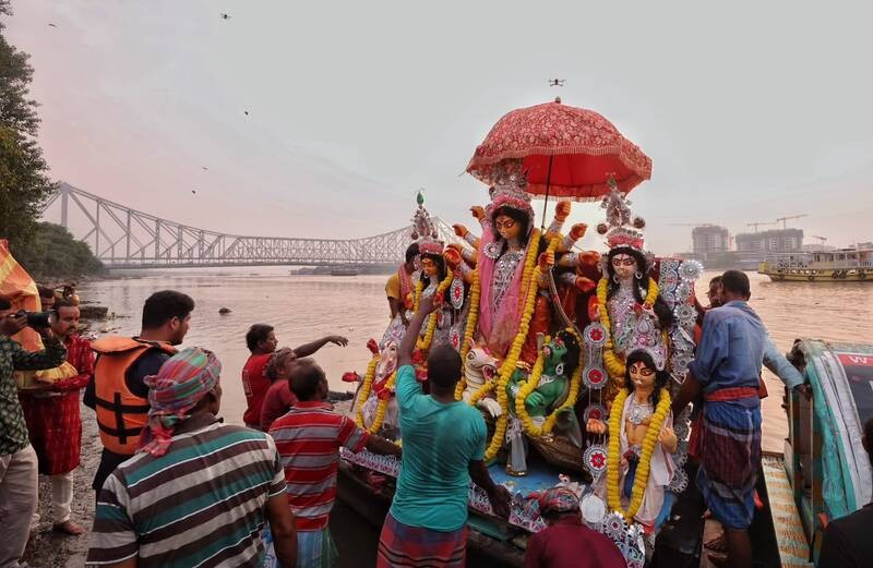 In Images: Sindoor Khela, idol immersion mark Bijoya Dashami in Kolkata