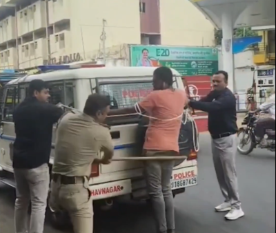 Gujarat police flogging video goes viral: Homeless murder accused tied with ropes, beaten during crime reconstruction