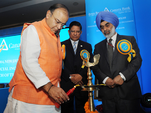Arun Jaitley lighting the lamp to inaugurate the 108 Financial Inclusion Branches 