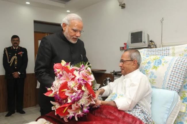 PM Modi meets President in hospital