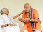 Narendra Modi taking blessing of his mother