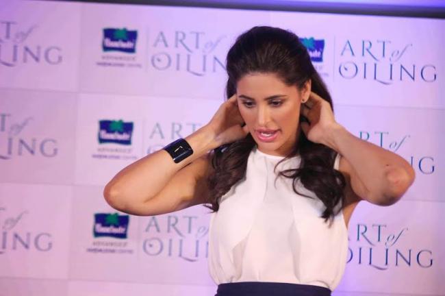 Nargis Fakhri launches the Art of Oiling