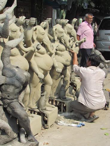 Artisans give final touches to Durga idols in Kumartoli