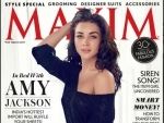 Amy sizzles on Maxim cover