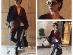 Deepika gets her initails on the Burberry Poncho