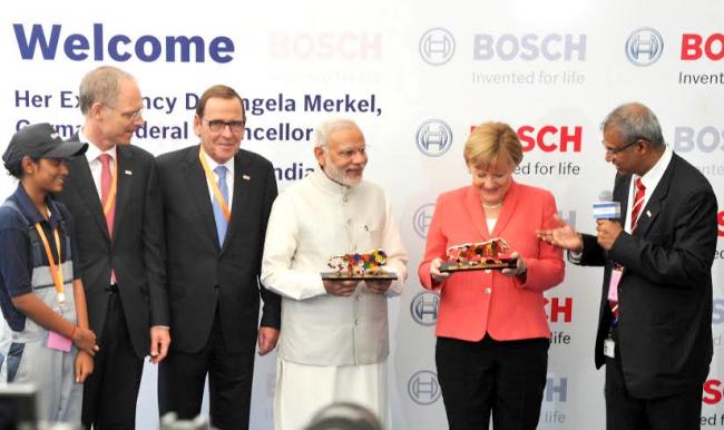 Narendra Modi and the German Chancellor, Dr. Angela Merkel visiting the Robert Bosch Engineering & Innovation Centre, in Bengaluru