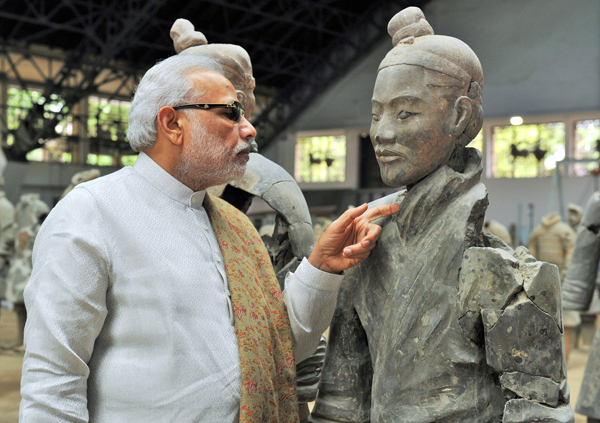 Modi visits museum, temple in Xi'an on arrival in China