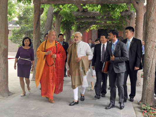  Modi interacting with the people near the Da Xing Shan Temple