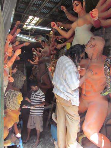 Artisans give final touches to Durga idols in Kumartoli