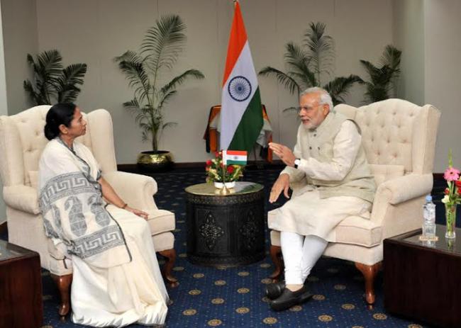 Mamata Banerjee meets PM Narendra Modi in Bangladesh