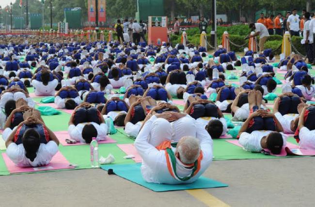 PM Modi leads mass yoga demonstration in Delhi on first International Yoga Day