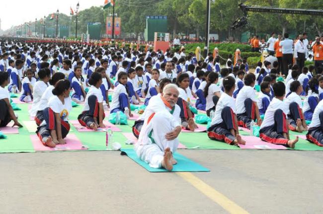 PM Modi leads mass yoga demonstration in Delhi on first International Yoga Day