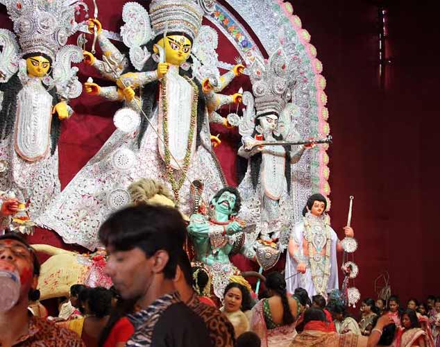 Revellers bid adieu to Goddess Durga on Maha Dashami