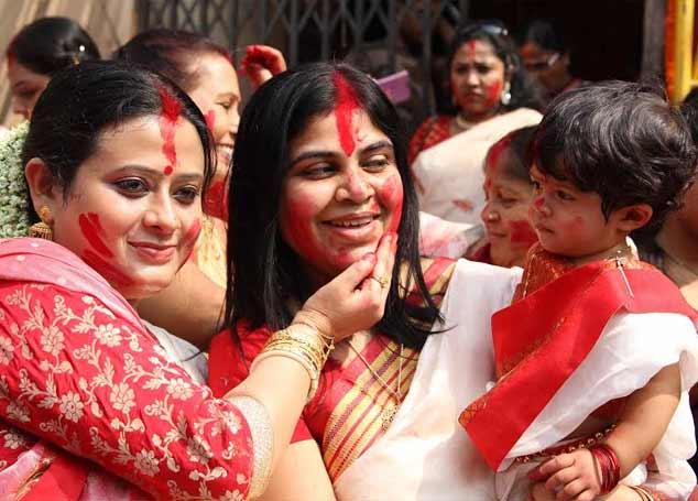 Revellers bid adieu to Goddess Durga on Maha Dashami