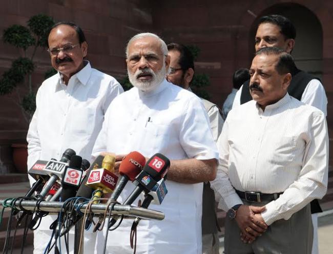  Narendra Modi delivering statement to the media outside the Parliament House