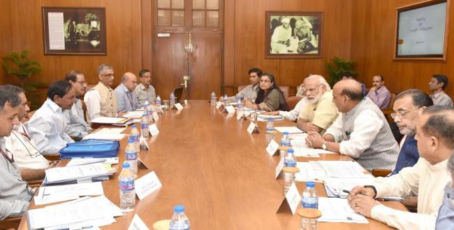 Narendra Modi meeting the Chief Minister of Telangana, Shri K. Chandrashekar Rao to discuss drought situation