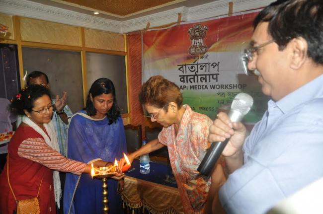 Additional Director General (M&C), PIB, Kolkata, Debanjan Chakrabarti and the senior journalist of Midnapore lighting the lamp 